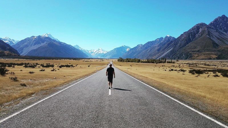 New Zealand road walking landscape mountains view travel shadow thinking journey