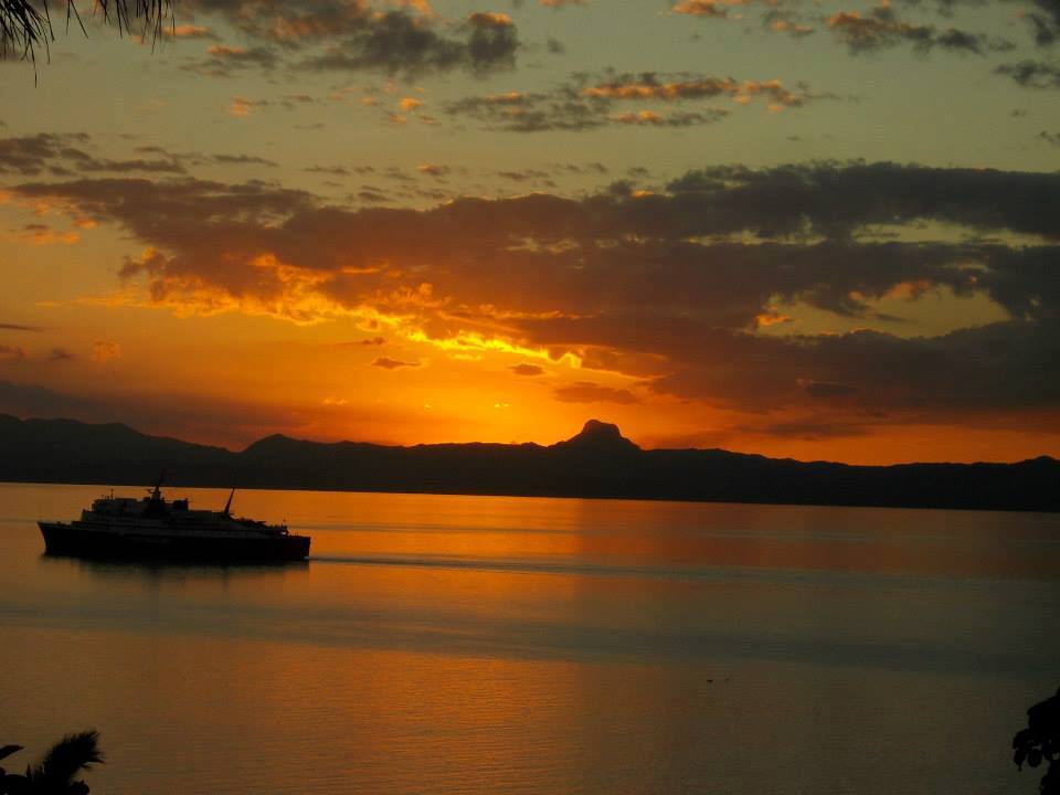 sunset over beach and sea